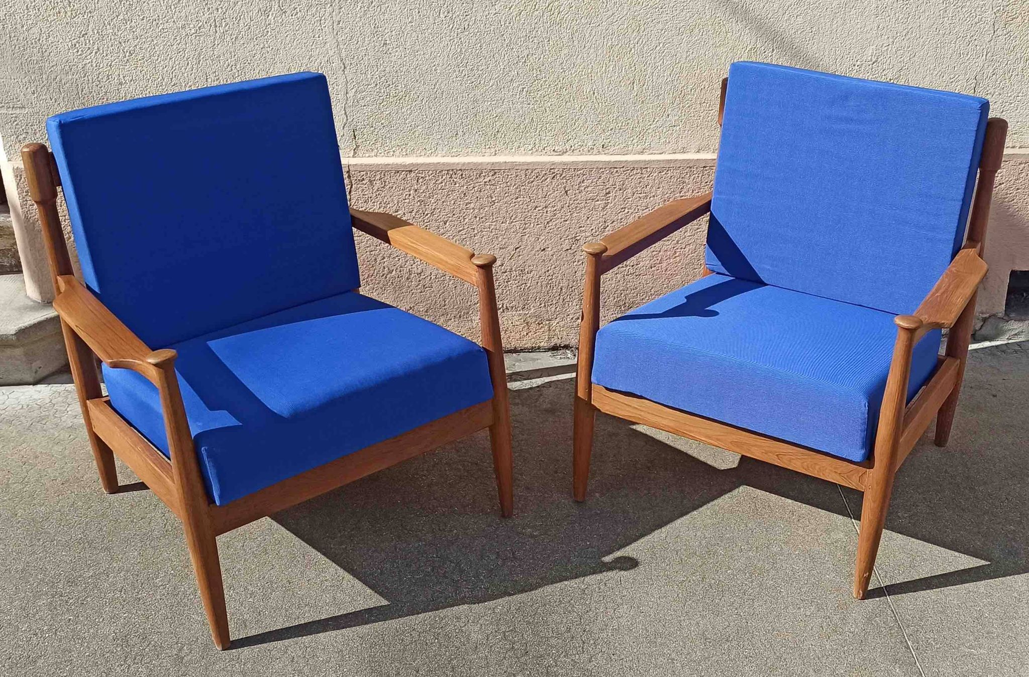 Pair of 1960s Scandinavian armchairs with blue cushions