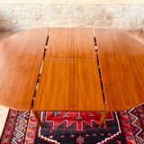 Expandable teak dining table, butterfly extension, circa 60s