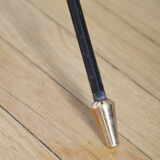 Black glass and brass coffee table in the 1960s