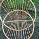Fauteuil en rotin vintage pieds metal