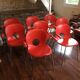 Lot de 8 chaises rouges vintage designer Raul Barbieri