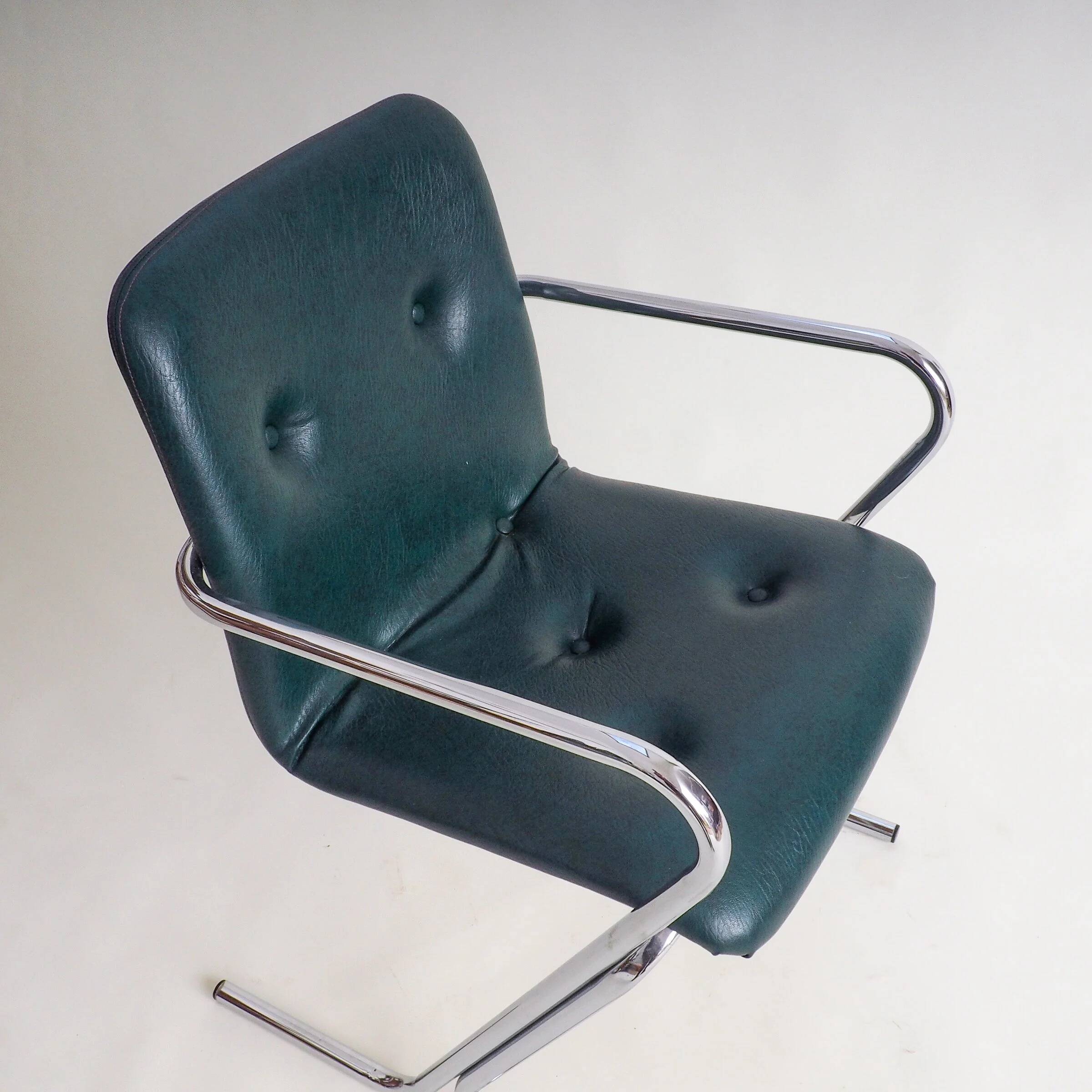 70s tubular arm chair by Tavo