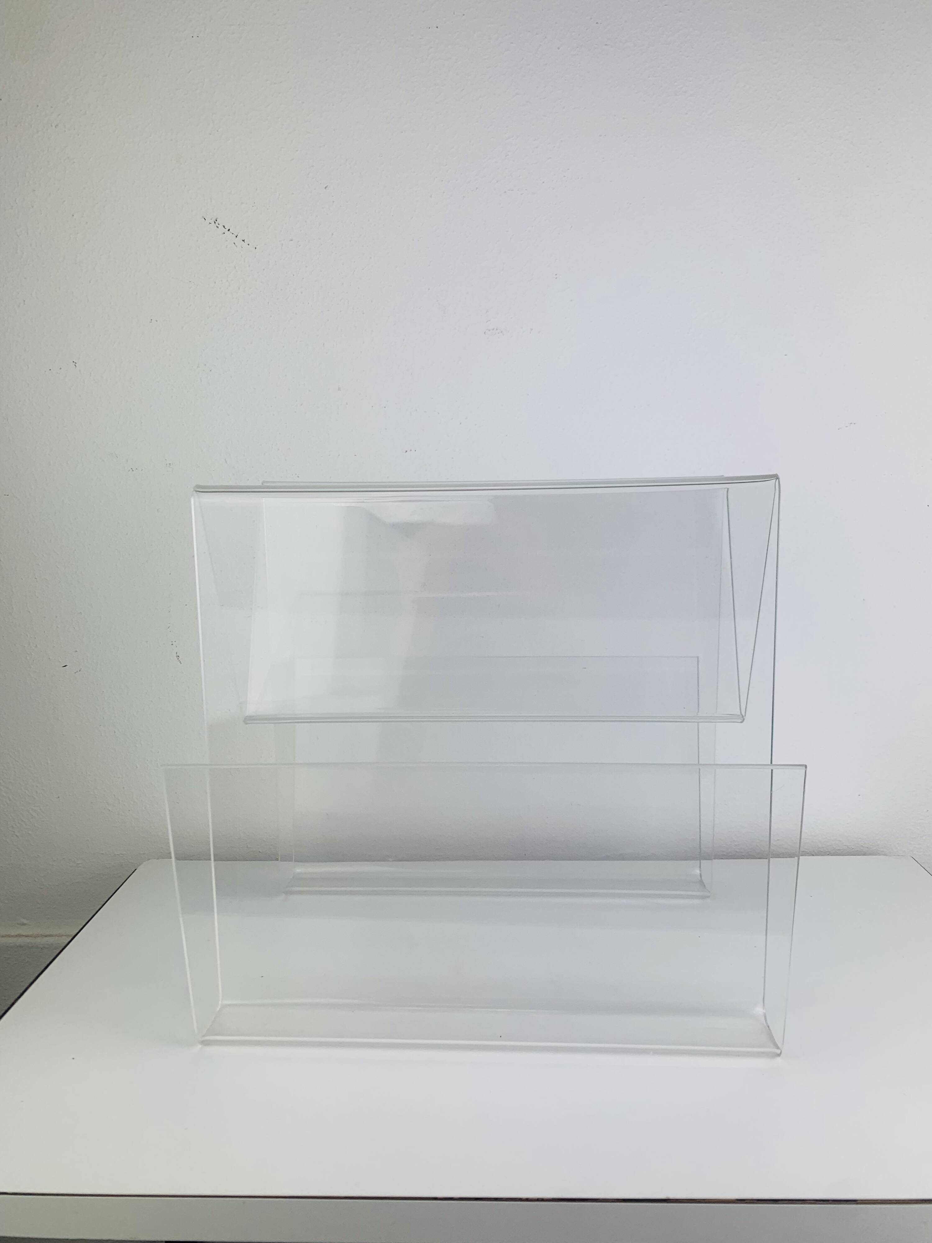 Acrylic magazine rack from the 70s.