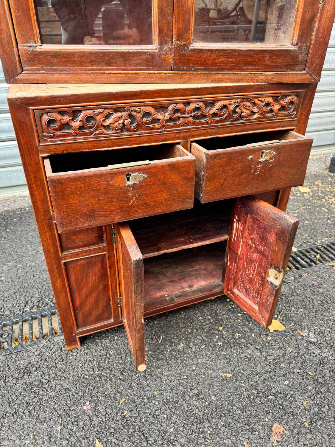 Attractive two-part Indochinese display cabinet. Mid-20th century