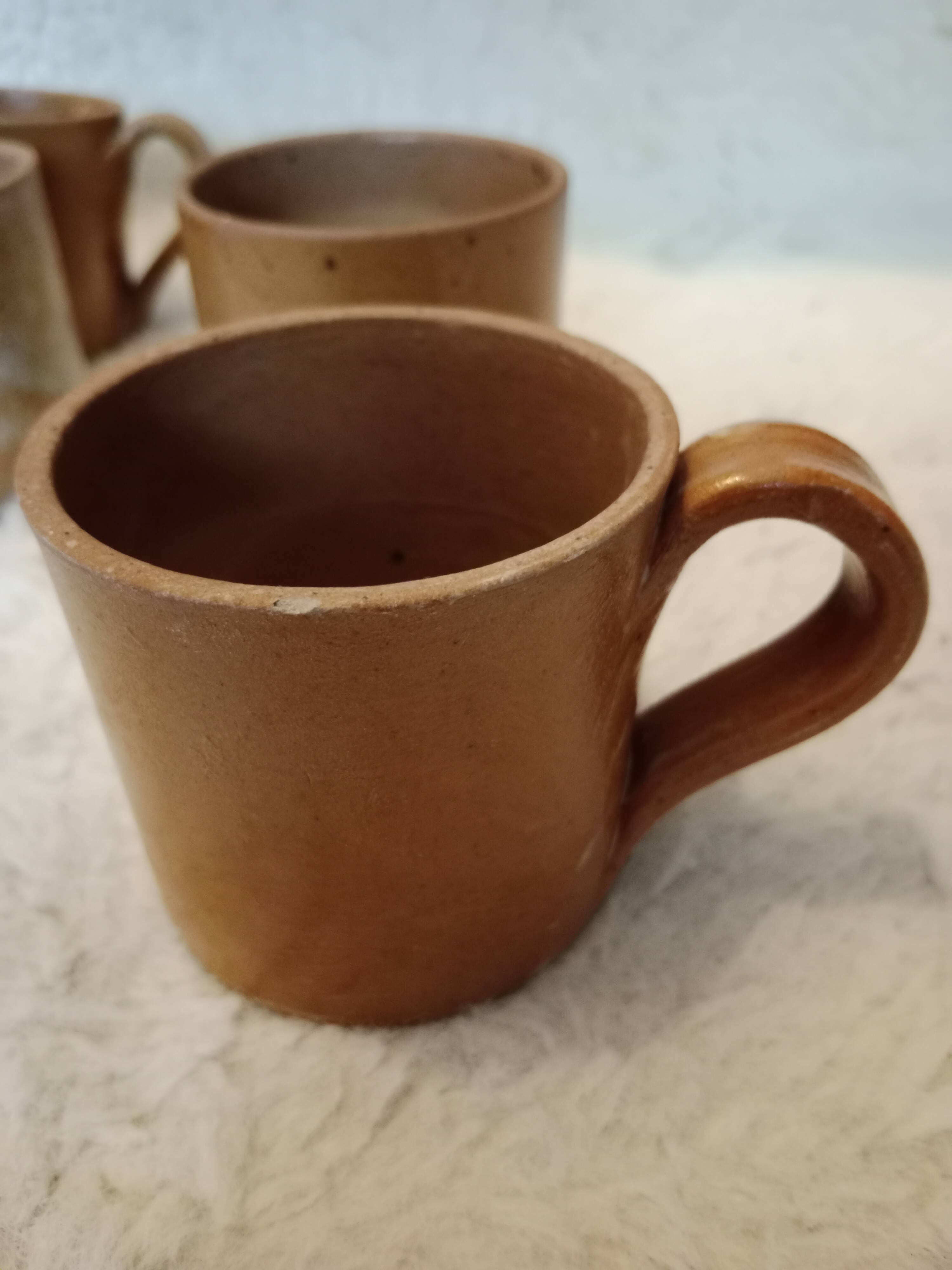 Vintage mismatched stoneware mugs