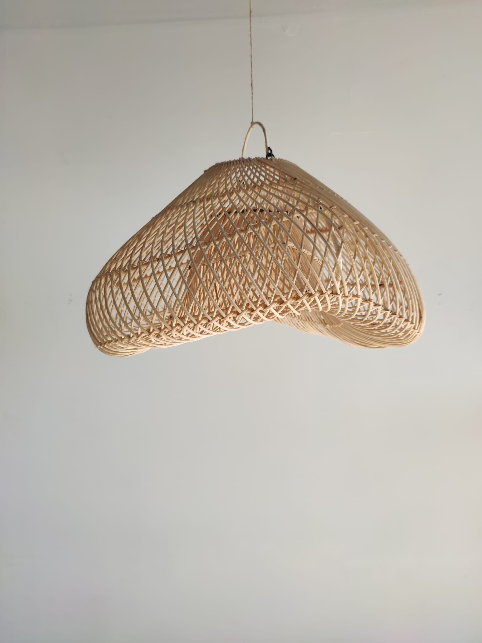 Small rattan lampshade in the shape of a braided hat