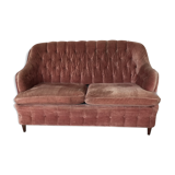 Pink velvet sofa