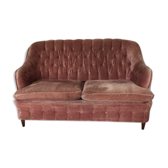 Pink velvet sofa