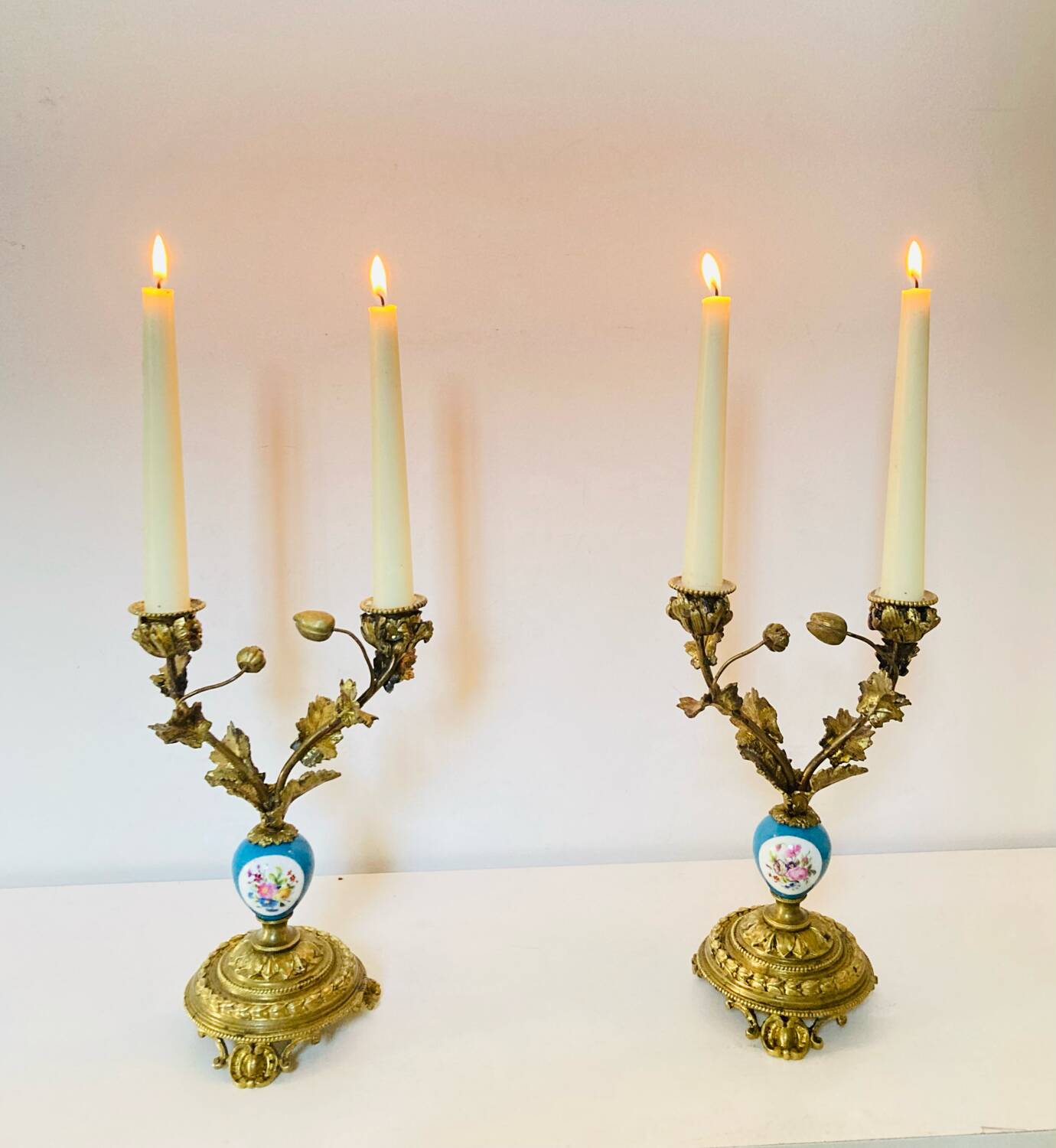 19th century candle holders in gilded bronze and porcelain