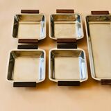 Service of Scandinavian dishes in stainless steel and teak 1970