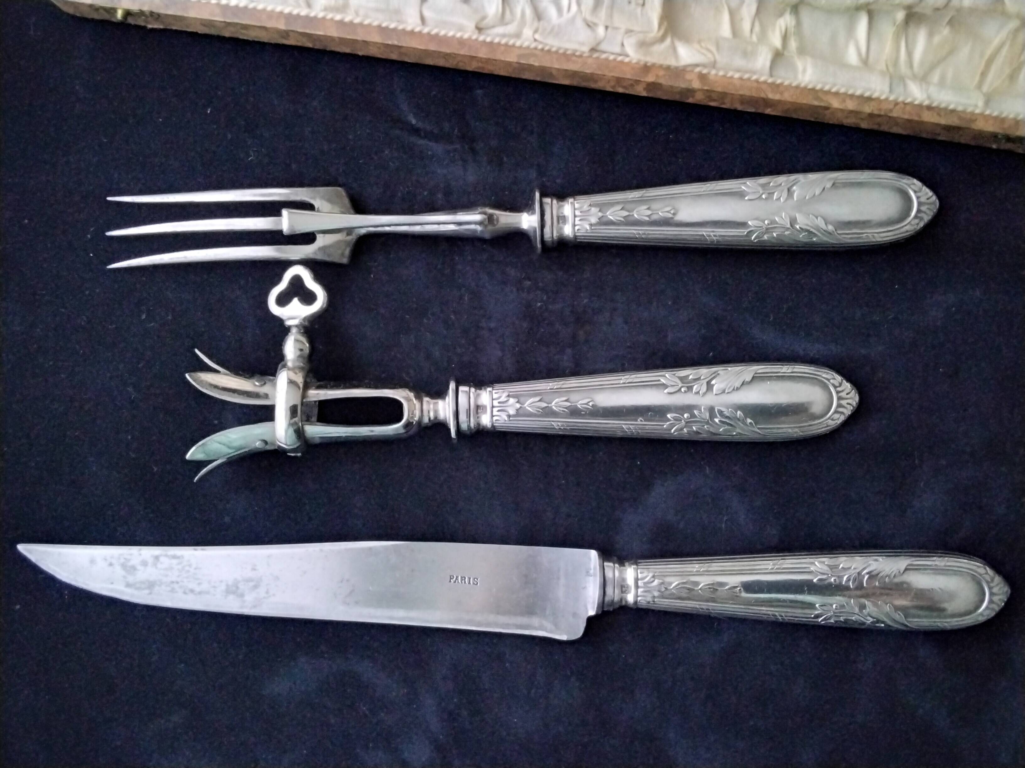 Old cutting service in steel and silver metal in its box