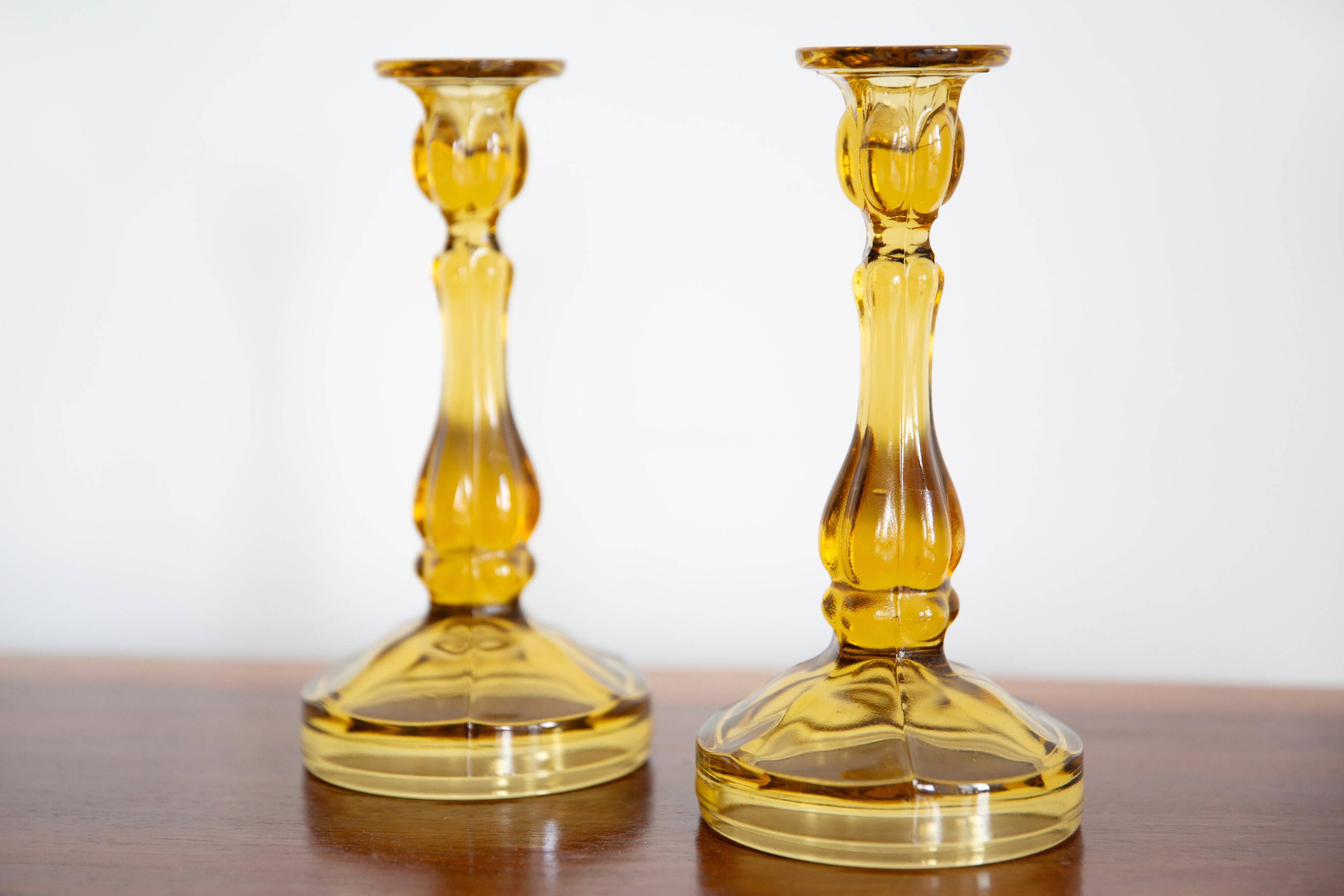 Set of two yellow glass candlesticks, Mid-Century Modern, Europe, 1960s.