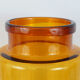 Old brown blown glass jar