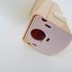 Vintage wall lamp in beige pvc with pink dot and globe in white opaline. Year 70