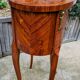 Old oval bedside table in rosewood marquetry Louis XV style