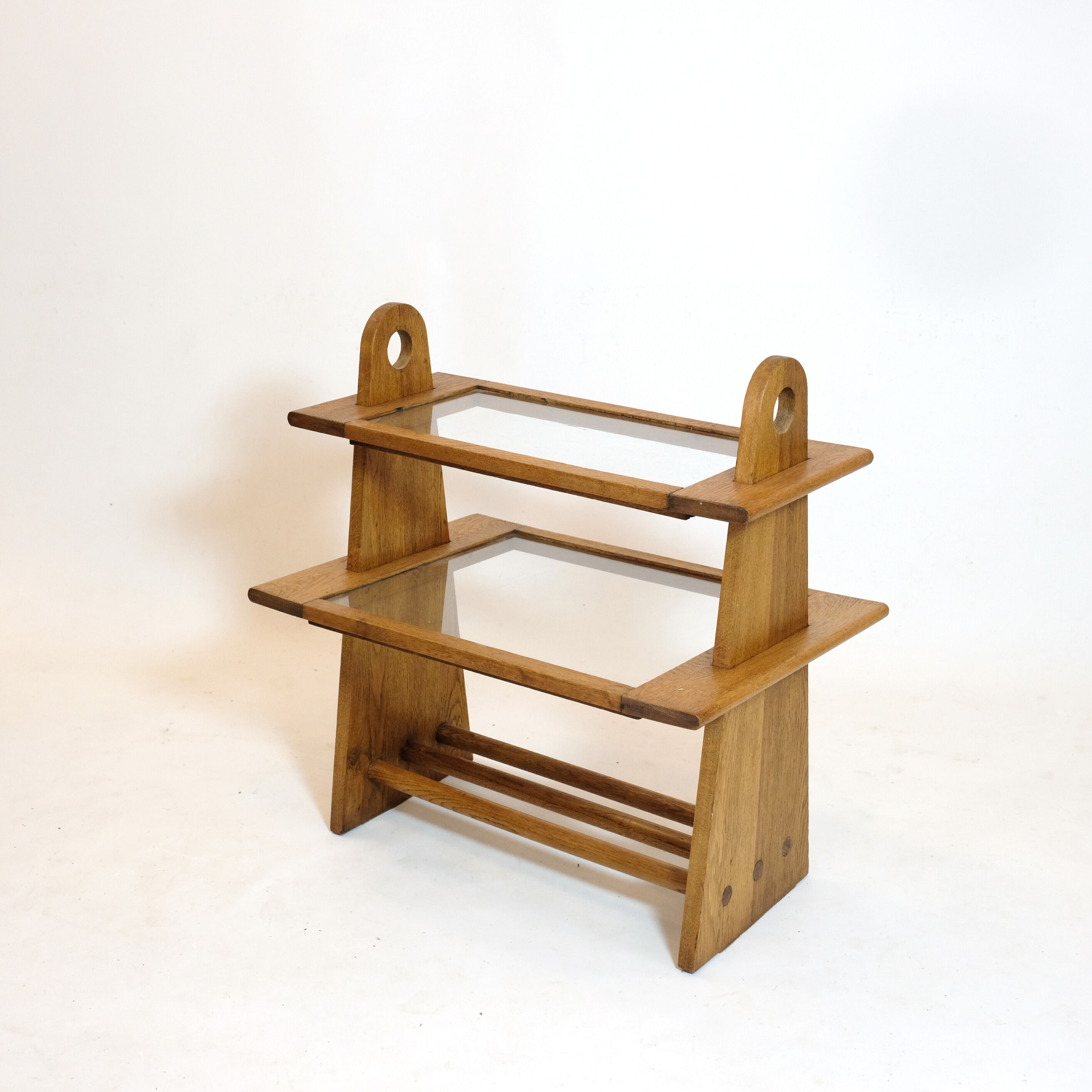 Served in oak and glass from the 50s and 60s.