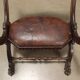 Antique neo-Renaissance chair in wood and leather, 20th century