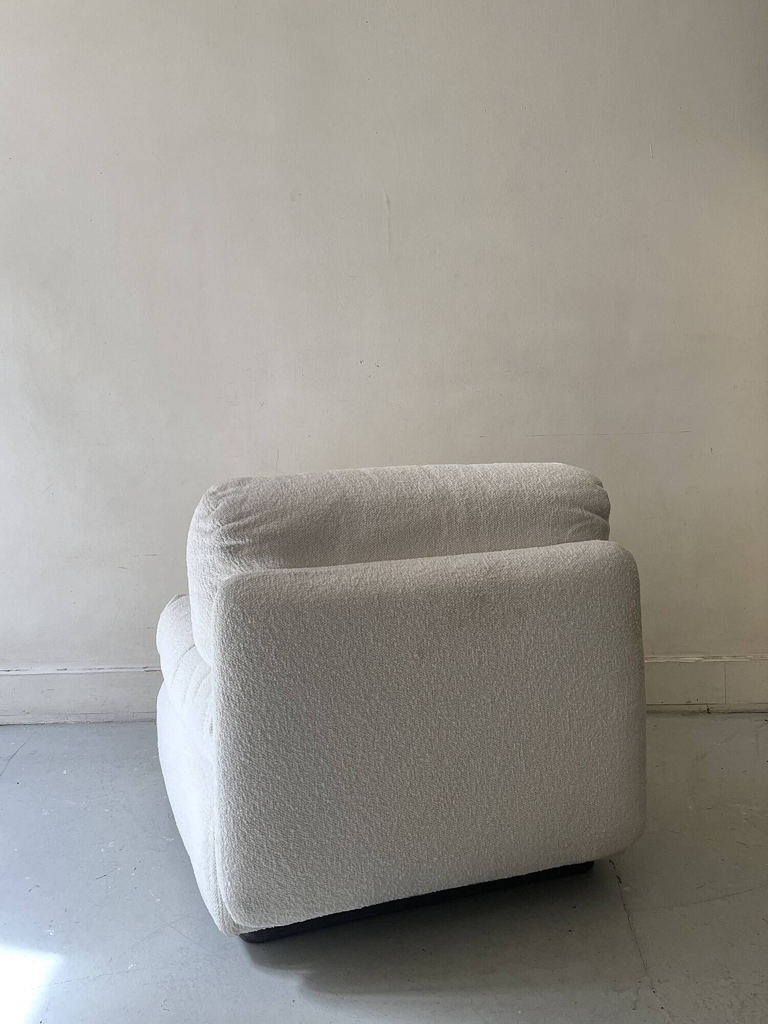 2 Italian off-white chenille armchairs with wooden base, 1970s design.