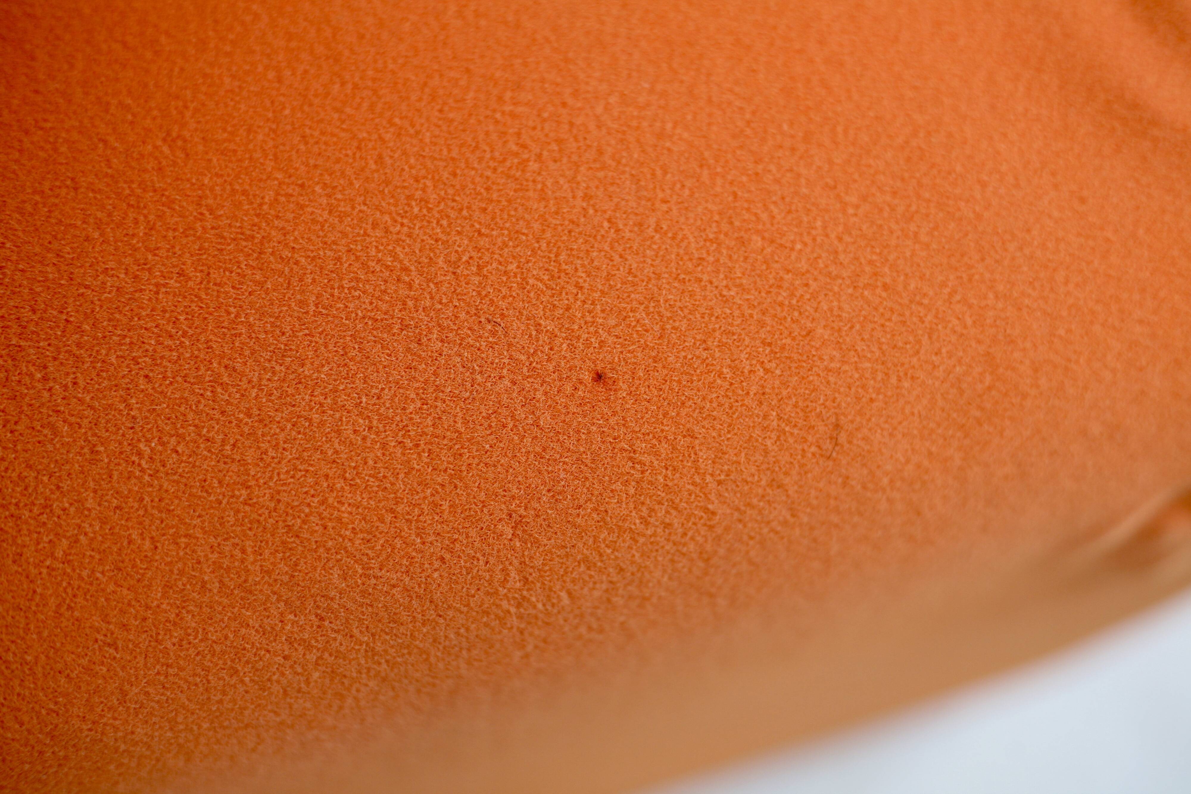 Armchair "space age" foam and orange jersey. Circa 1970