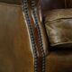 Cognac-colored subtle armchair
