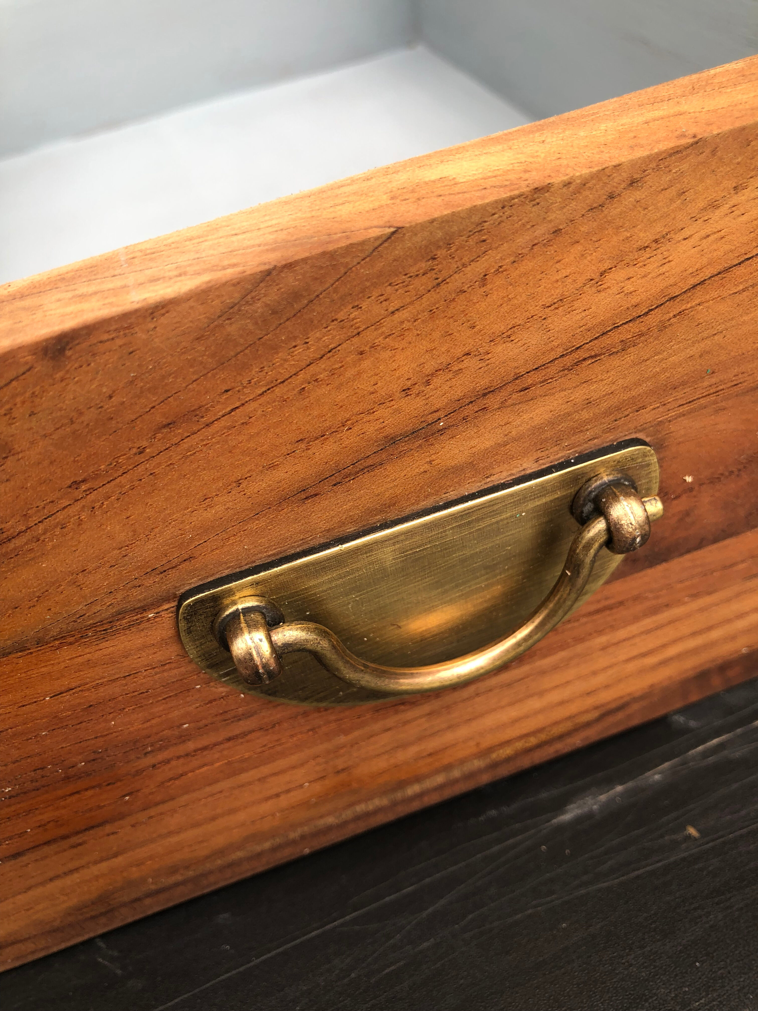Wooden drawer brass handle