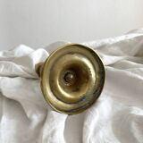 Antique brass candlestick in vintage baluster shape