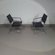 2 chaises pliantes en cuir chromé