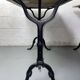 Set of two bistro tables in marble and wrought iron