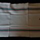 Set of ten antique cotton honeycomb towels hand-embroidered figure