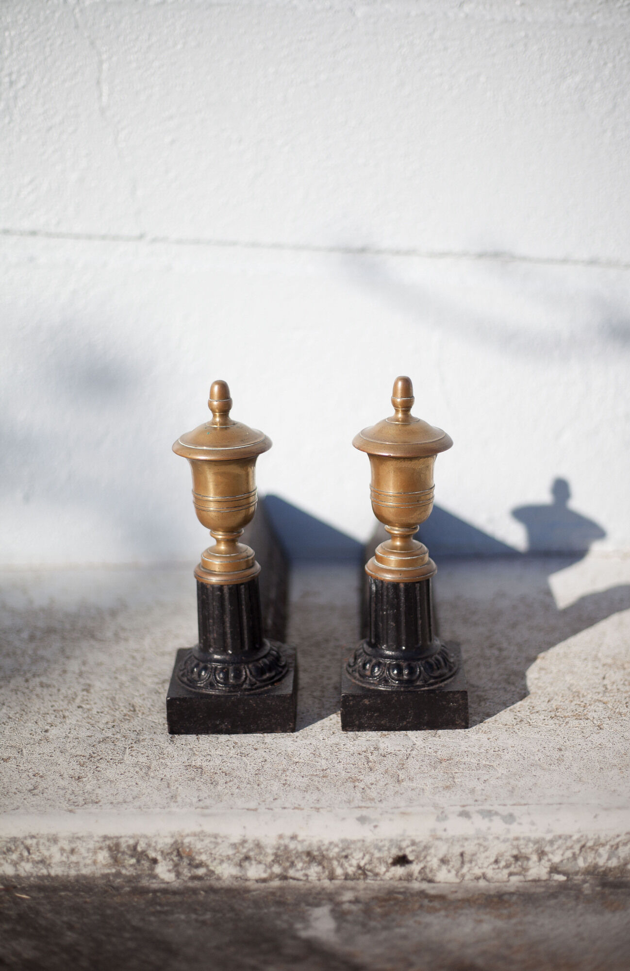 Cast iron and brass chenets