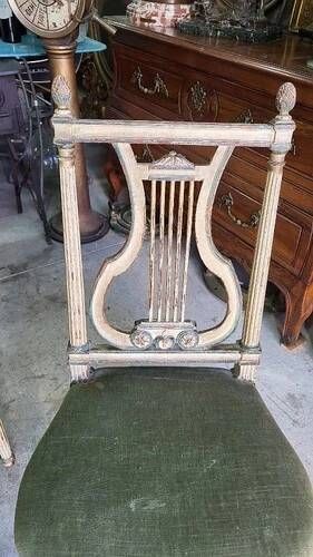 Pair of Louis XVI style chairs from the 18th century with lyre back.