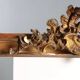 Golden wooden cornice with rocaille carving