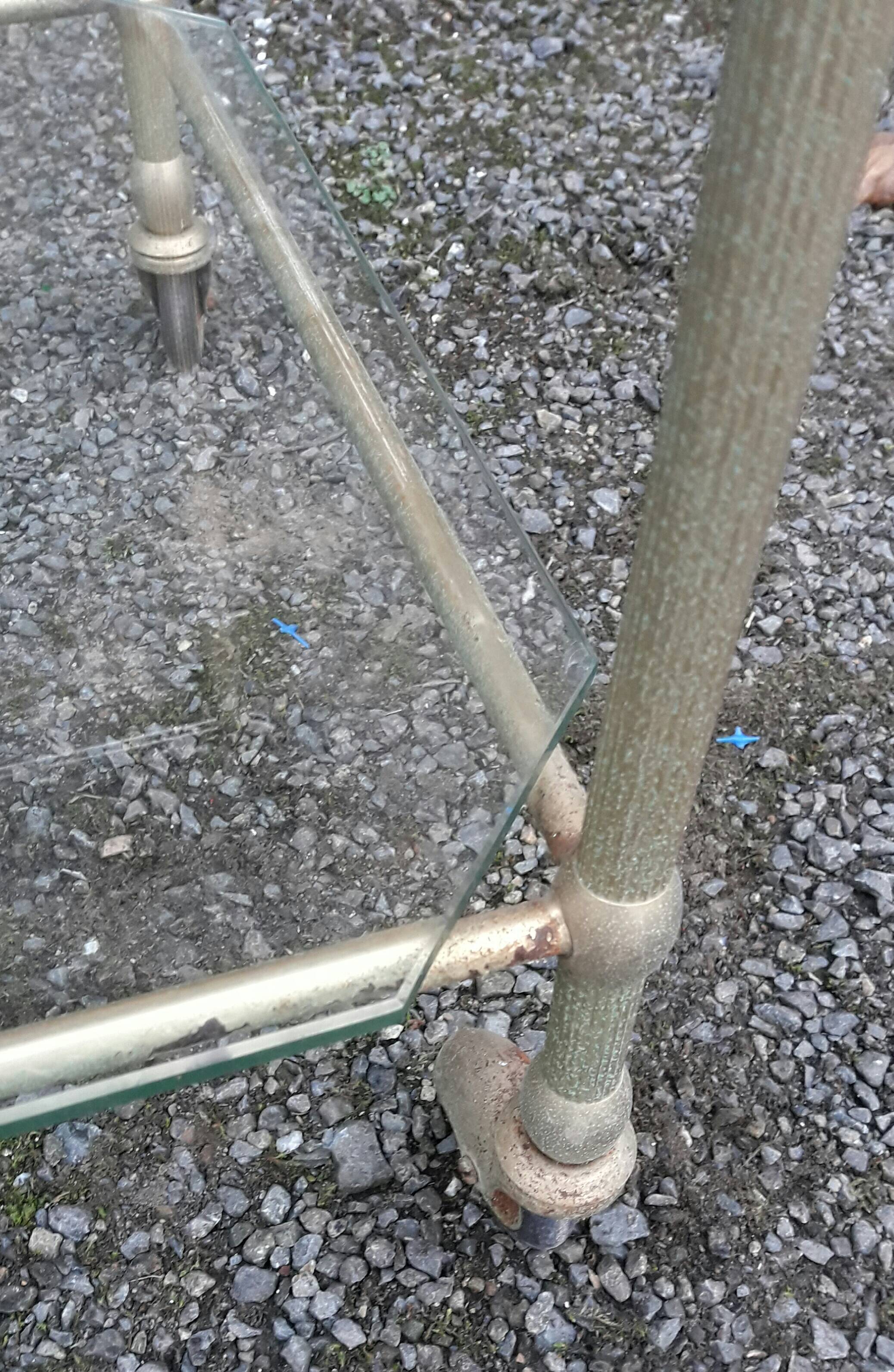 Small rolling table in glass and gold metal