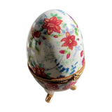 Porcelain egg on foot