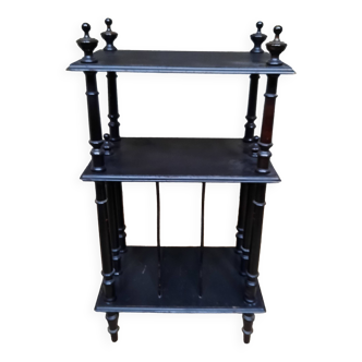 Blackened wooden shelf
