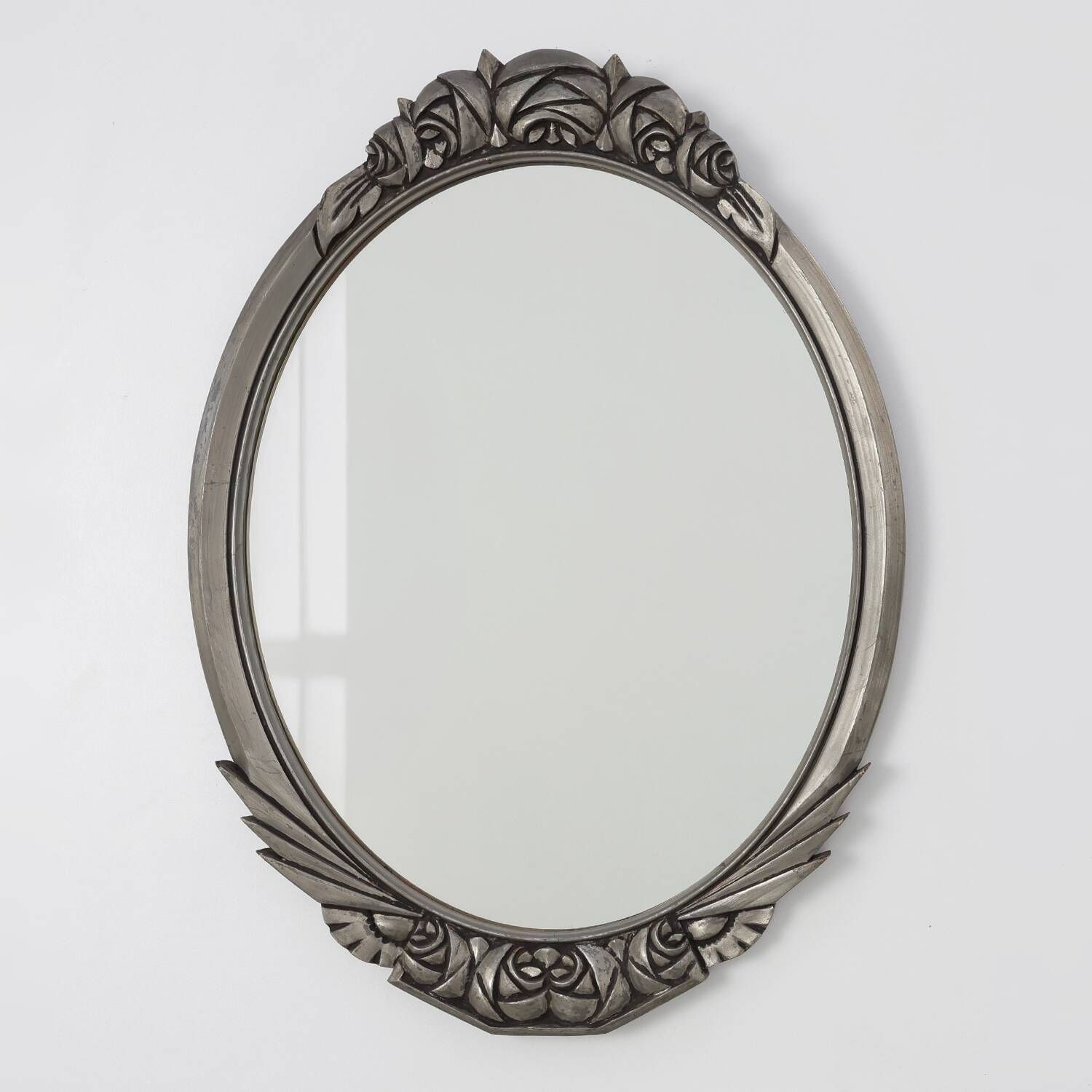 French Art Deco Oval Mirror with Carved Roses and Silver-Painted Frame