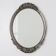 French Art Deco Oval Mirror with Carved Roses and Silver-Painted Frame