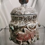 Ceramic pot decorated with bulls in relief