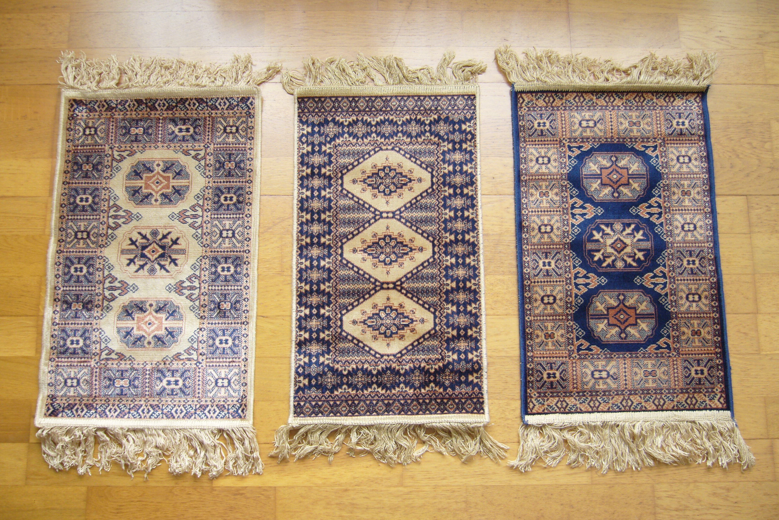 Three oriental rugs 35 x 70 cm