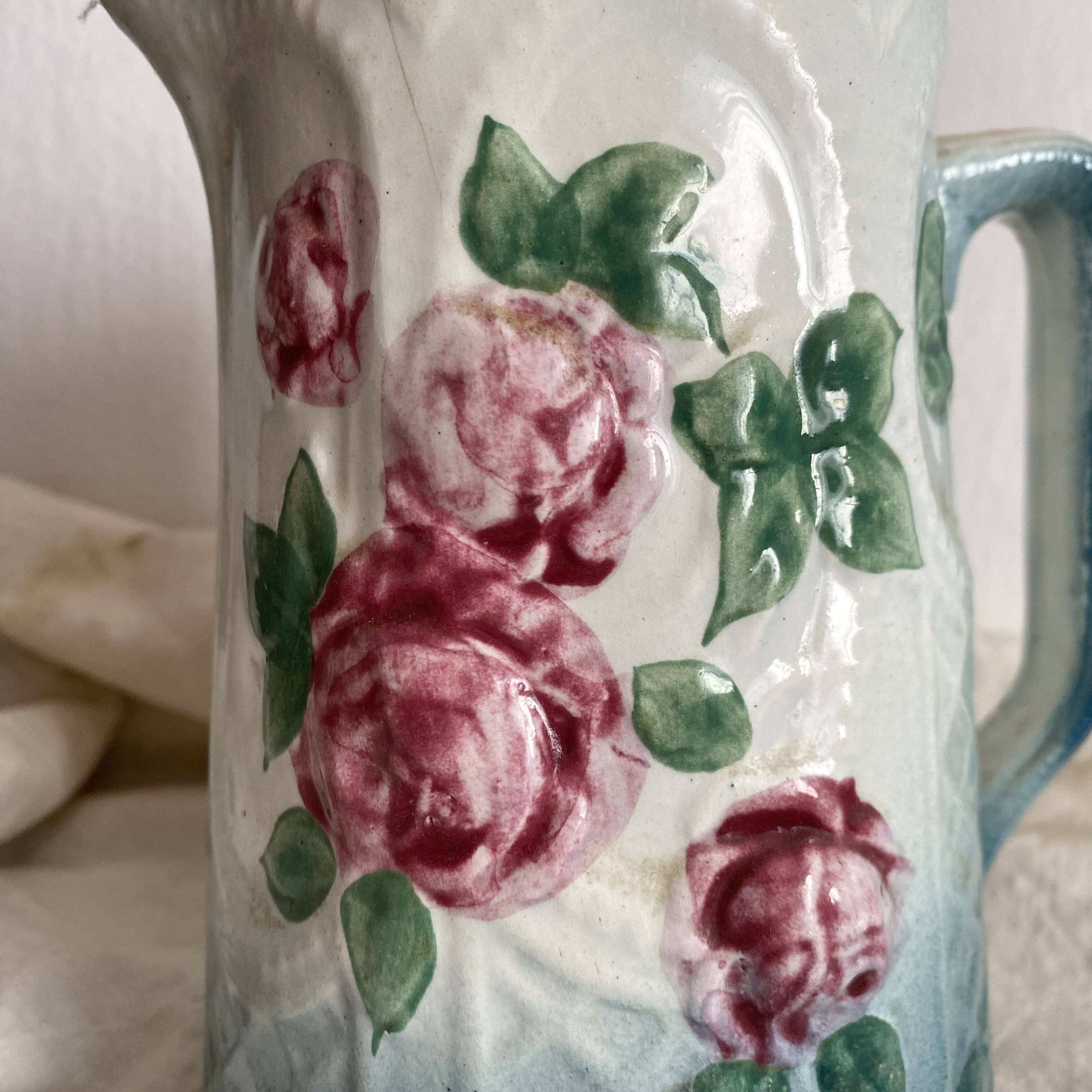 Art Nouveau slip pitcher with roses