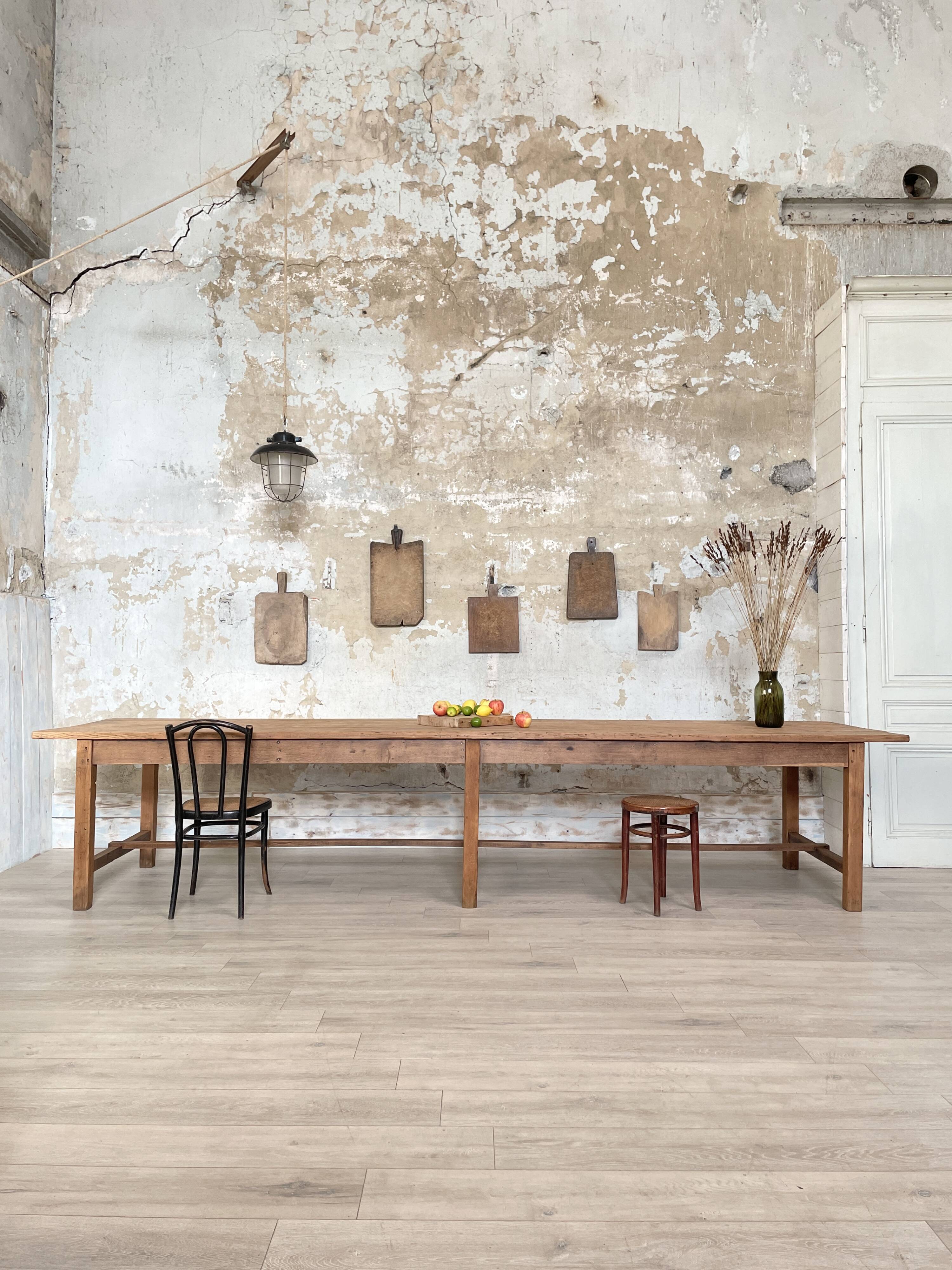 Solid wood workshop table with straight legs.