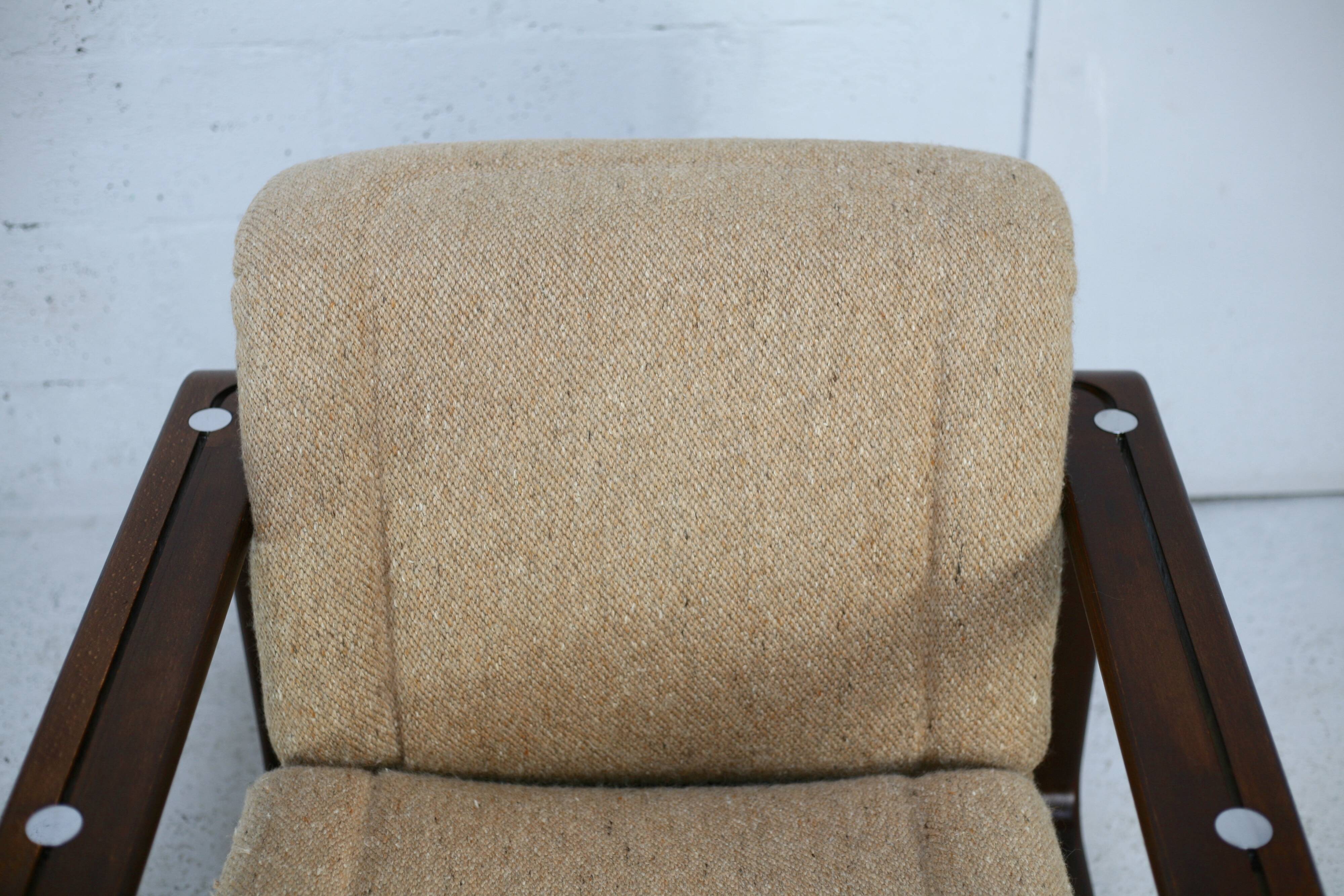 Modernist armchair. Wool, wood and steel. Circa 1970
