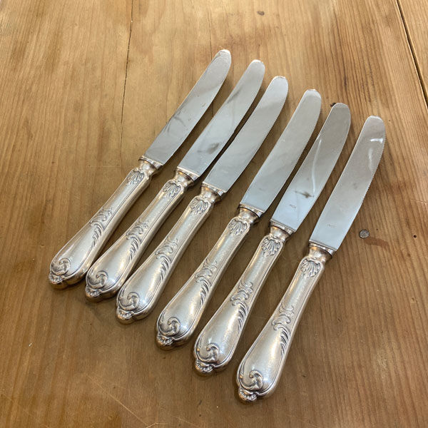 Series of 6 silver metal knives