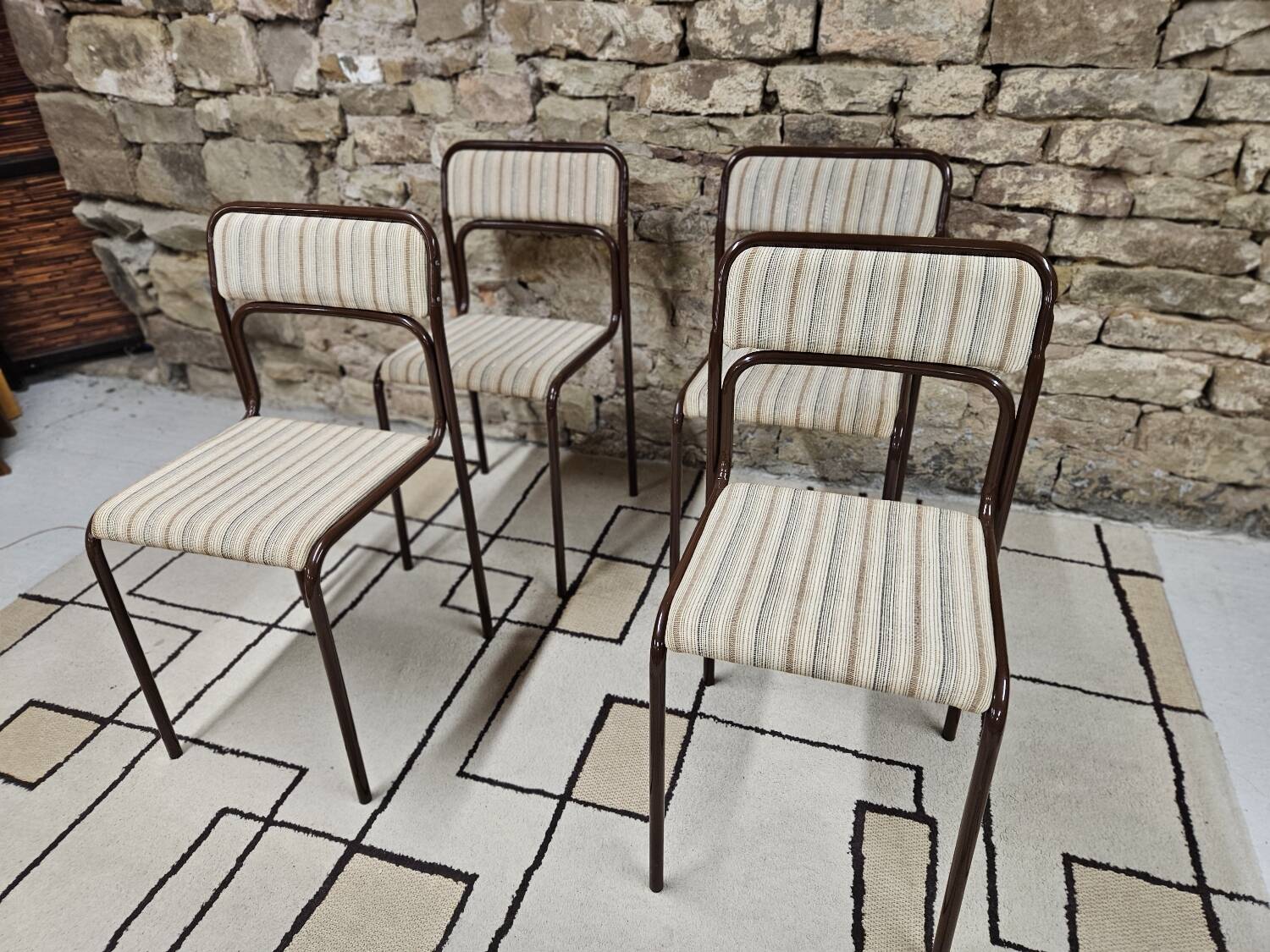 Set of 4 vintage stackable chairs 1980