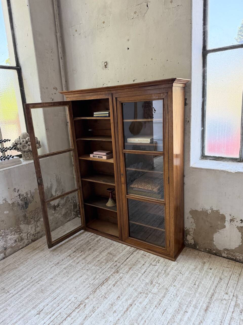 Glass-fronted walnut library 1900