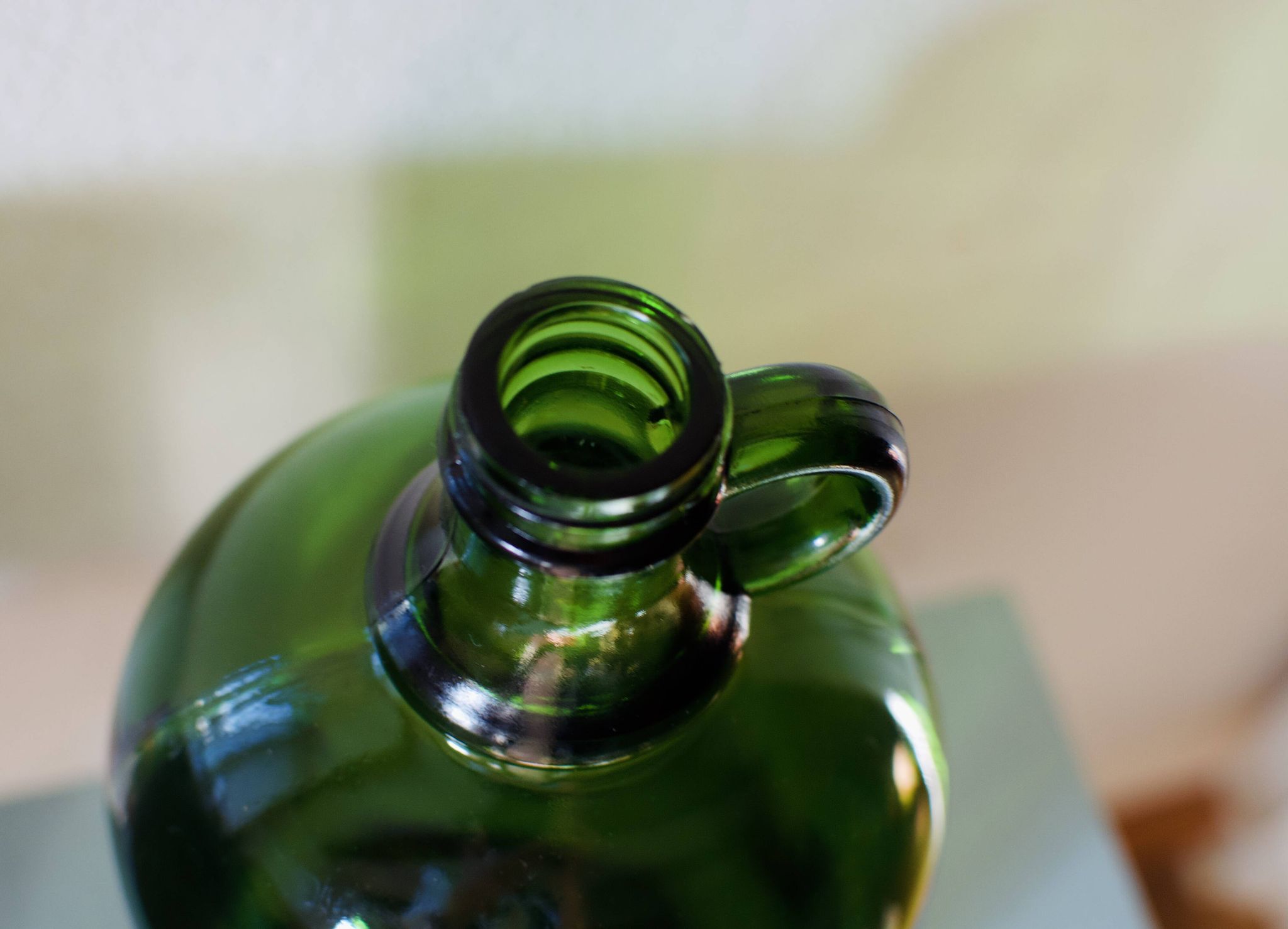 Bonbonne vintage en verre vert