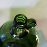 Bonbonne vintage en verre vert