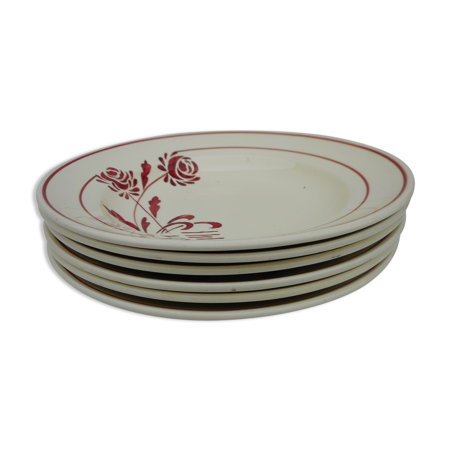 Six hollow earthenware plates