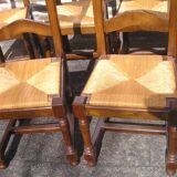 Set of 6 oak dining chairs with high backs and straw seats
