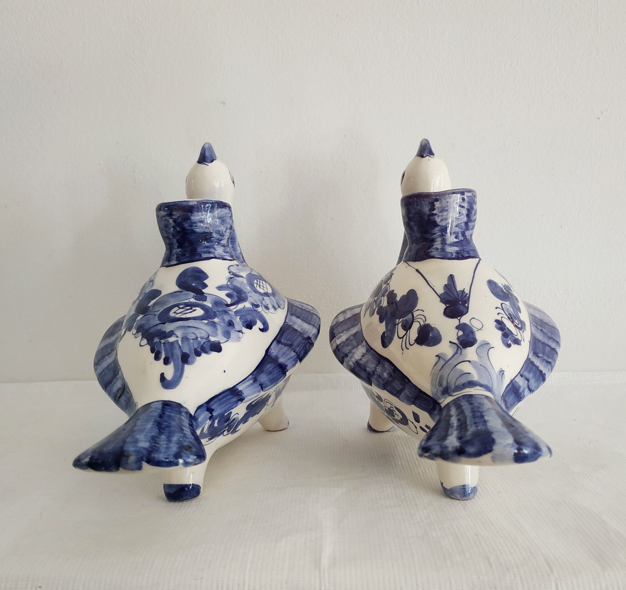 Pair of bird candlesticks in blue white, Skyros earthenware